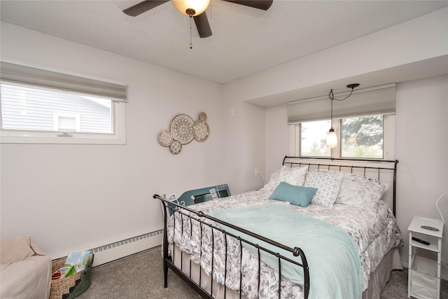 729 SE 3rd St, Ankeny, IA 50021 - bedroom featuring carpet, a ceiling fan, and baseboard heating
