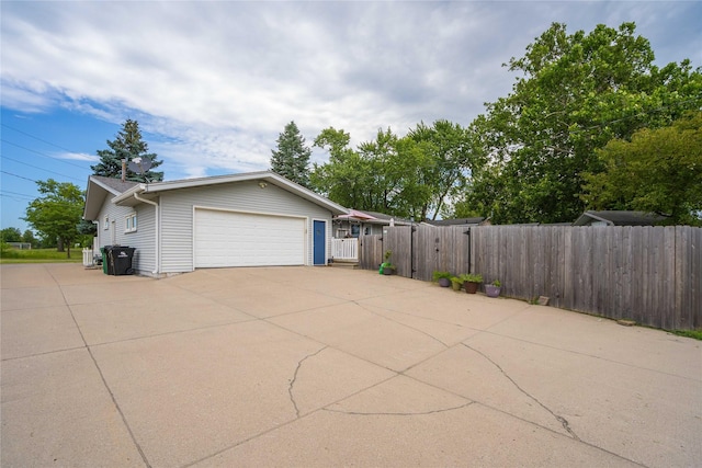 729 SE 3rd St, Ankeny, IA 50021 - view of home's exterior featuring concrete driveway, a garage, and a gate