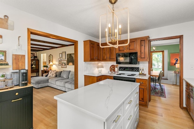 10438 Donna Bella Cir, Clive, IA 50325 - kitchen with black microwave, white range with electric cooktop, a chandelier, light wood-style flooring, and backsplash