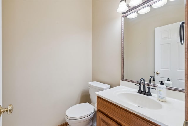 303 Trevor Ct, Norwalk, IA 50211 - half bathroom featuring toilet and vanity