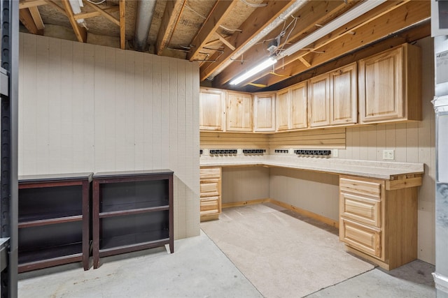 303 Trevor Ct, Norwalk, IA 50211 - unfurnished office with concrete floors and wooden walls