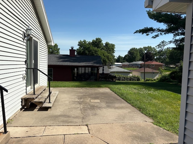 3909 75th St, Urbandale, IA 50322 - view of patio with entry steps