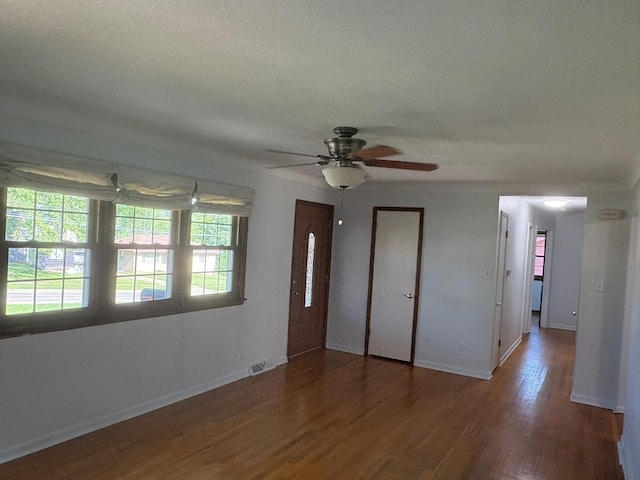 3909 75th St, Urbandale, IA 50322 - unfurnished bedroom with wood finished floors and ceiling fan