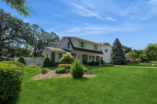 4511 67th St, Urbandale, IA 50322 - traditional-style house featuring brick siding