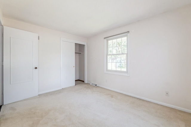 4511 67th St, Urbandale, IA 50322 - unfurnished bedroom with carpet floors and a closet