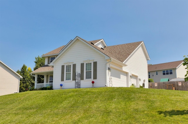 1695 Pease Dr, Pleasant Hill, IA 50327 - rear view of house with a shingled roof and a garage