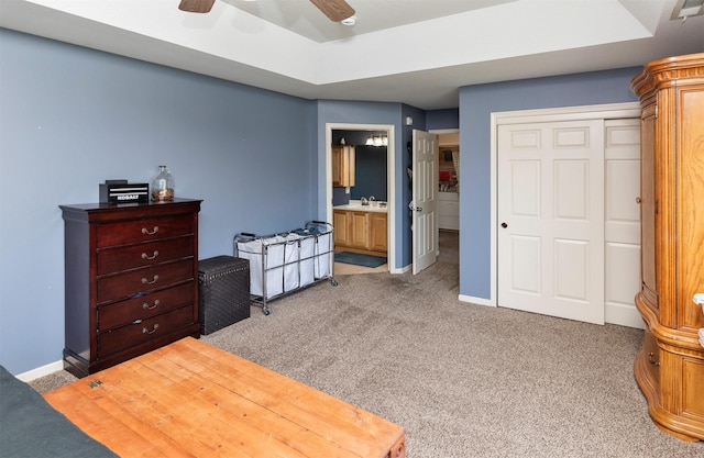 1695 Pease Dr, Pleasant Hill, IA 50327 - bedroom with light carpet, a closet, ensuite bathroom, and a ceiling fan