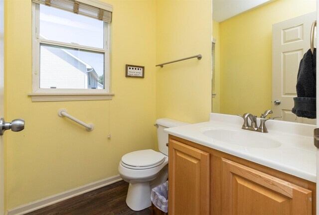 1695 Pease Dr, Pleasant Hill, IA 50327 - bathroom with vanity and wood finished floors