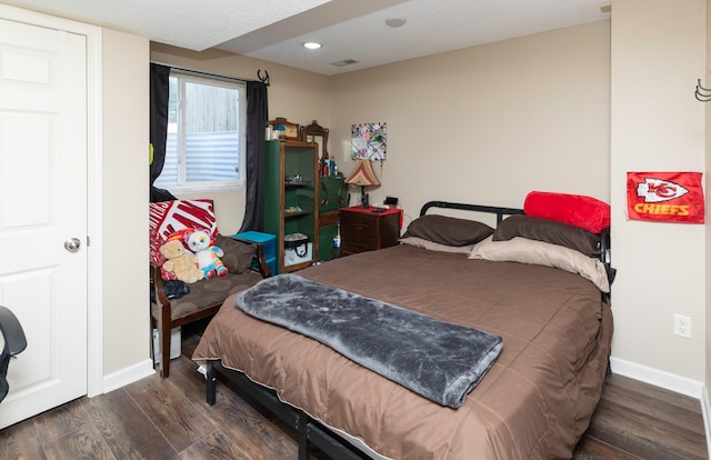 1695 Pease Dr, Pleasant Hill, IA 50327 - bedroom with wood finished floors and recessed lighting