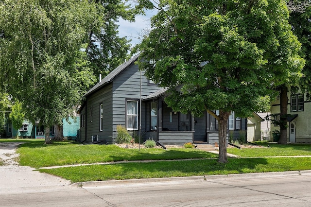 404 W Salem Ave, Indianola, IA 50125 - view of front of property with a front lawn and a porch
