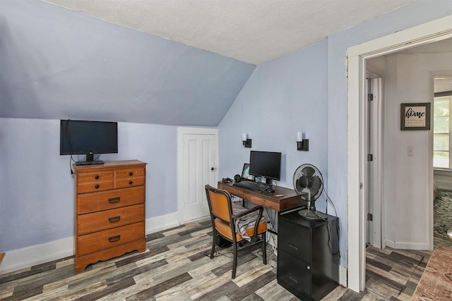 404 W Salem Ave, Indianola, IA 50125 - office area with wood finished floors, vaulted ceiling, and a textured ceiling