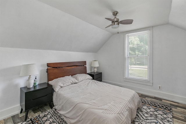 404 W Salem Ave, Indianola, IA 50125 - bedroom featuring vaulted ceiling, wood finished floors, and ceiling fan