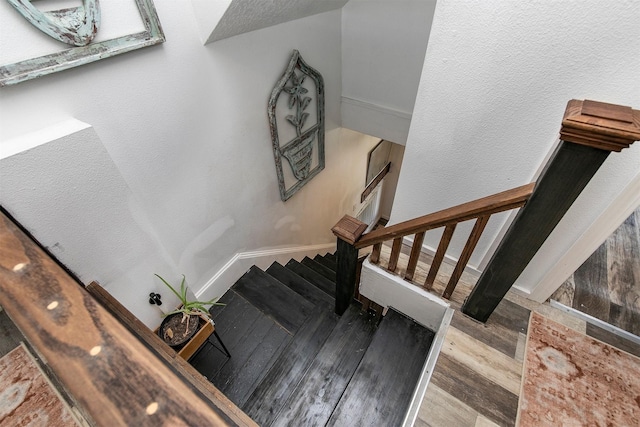 404 W Salem Ave, Indianola, IA 50125 - stairs featuring wood finished floors and baseboards
