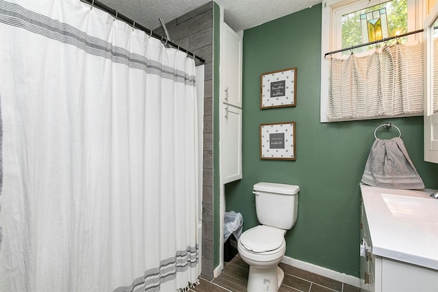 404 W Salem Ave, Indianola, IA 50125 - bathroom featuring vanity, a textured ceiling, and curtained shower