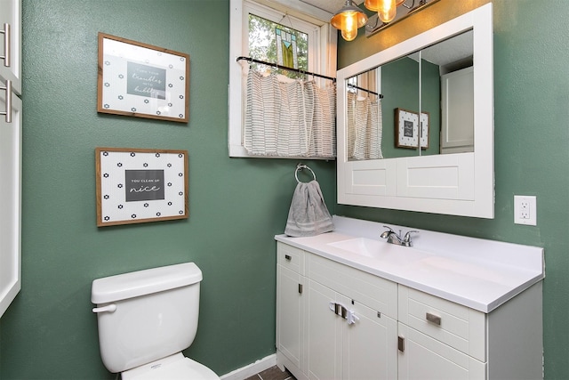 404 W Salem Ave, Indianola, IA 50125 - bathroom featuring vanity and a chandelier