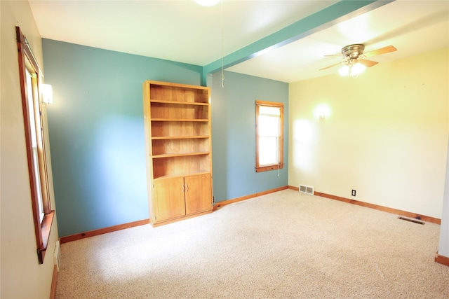 24388 250th St, Eldora, IA 50627 - carpeted spare room featuring baseboards and ceiling fan