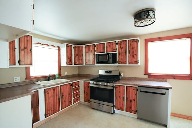 24388 250th St, Eldora, IA 50627 - kitchen with appliances with stainless steel finishes and a sink