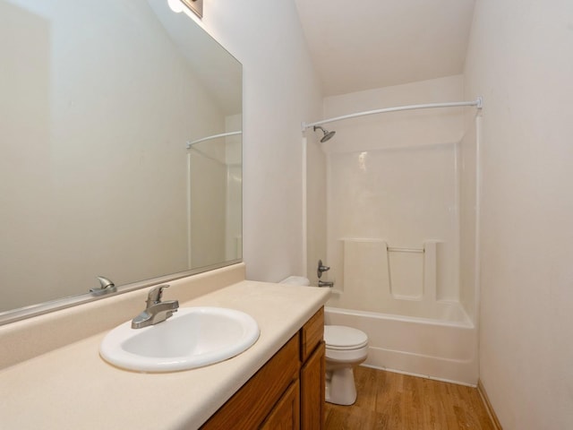 1246 SE Village View Ln, Ankeny, IA 50021 - bathroom with vanity, wood finished floors, and bathing tub / shower combination