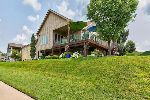 2100 NW Prairie Creek Dr, Grimes, IA 50111 - back of property featuring a yard, a deck, and stairs