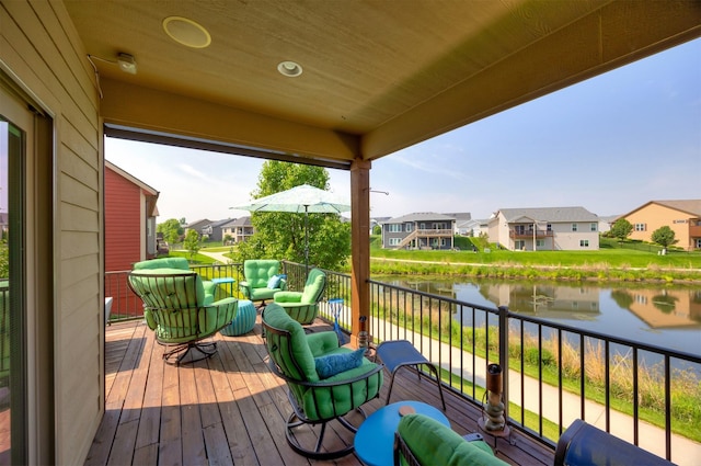 2100 NW Prairie Creek Dr, Grimes, IA 50111 - deck featuring a residential view, a water view, and an outdoor hangout area