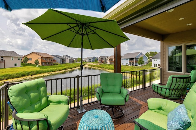 2100 NW Prairie Creek Dr, Grimes, IA 50111 - wooden deck featuring a residential view and a water view