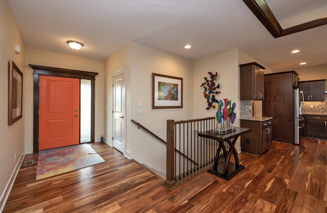 2100 NW Prairie Creek Dr, Grimes, IA 50111 - foyer featuring dark wood-style floors and recessed lighting