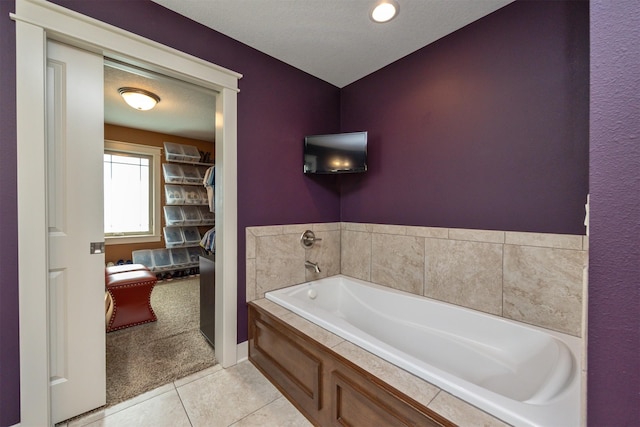 2100 NW Prairie Creek Dr, Grimes, IA 50111 - full bathroom with a bath and tile patterned floors
