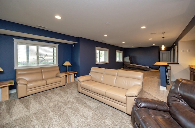 2100 NW Prairie Creek Dr, Grimes, IA 50111 - carpeted living area with recessed lighting and tile patterned flooring