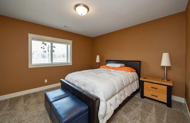 2100 NW Prairie Creek Dr, Grimes, IA 50111 - bedroom featuring dark colored carpet and baseboards
