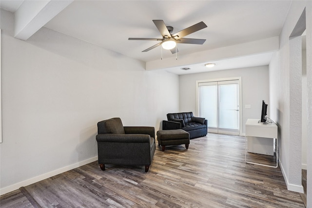 9 1st St, Collins, IA 50055 - sitting room featuring wood finished floors and a ceiling fan