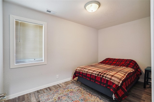 9 1st St, Collins, IA 50055 - bedroom with wood finished floors
