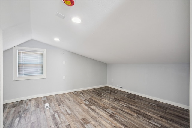 9 1st St, Collins, IA 50055 - additional living space featuring lofted ceiling, wood finished floors, and recessed lighting