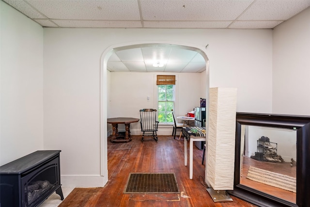 121 Cherry Ave, Ames, IA 50010 - hall featuring a drop ceiling, arched walkways, and hardwood / wood-style flooring