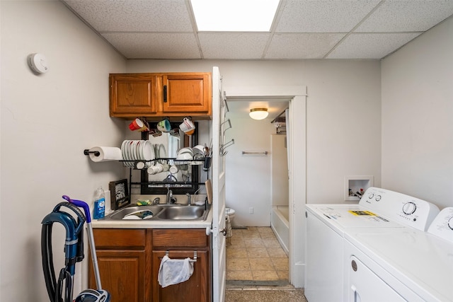 121 Cherry Ave, Ames, IA 50010 - washroom featuring washer and clothes dryer and cabinet space
