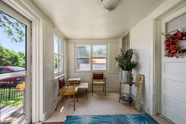 121 Cherry Ave, Ames, IA 50010 - sunroom featuring a textured wall