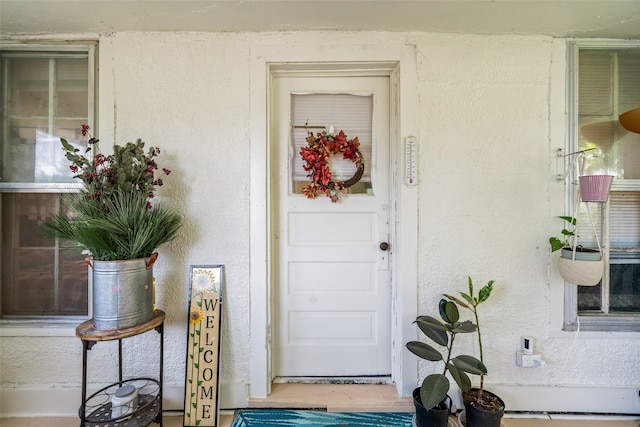121 Cherry Ave, Ames, IA 50010 - entrance to property featuring stucco siding