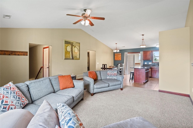 16215 Monroe Ct, Urbandale, IA 50323 - living room featuring ceiling fan, lofted ceiling, and light colored carpet