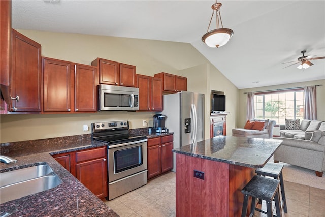 16215 Monroe Ct, Urbandale, IA 50323 - kitchen featuring stainless steel appliances, lofted ceiling, open floor plan, a breakfast bar area, and light tile patterned flooring