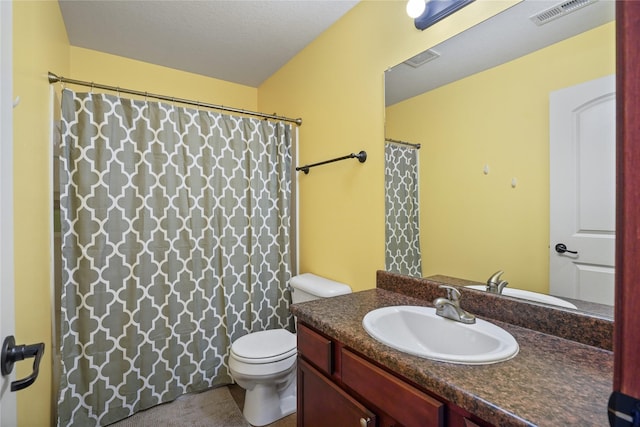 16215 Monroe Ct, Urbandale, IA 50323 - bathroom with toilet and vanity
