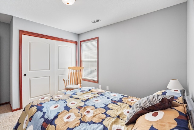 16215 Monroe Ct, Urbandale, IA 50323 - bedroom featuring a closet and carpet floors