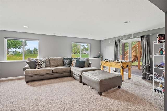16215 Monroe Ct, Urbandale, IA 50323 - living area featuring carpet, plenty of natural light, and recessed lighting