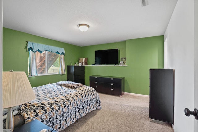16215 Monroe Ct, Urbandale, IA 50323 - carpeted bedroom featuring baseboards