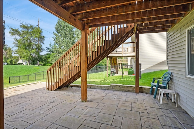 16215 Monroe Ct, Urbandale, IA 50323 - fenced backyard featuring stairway and a patio area