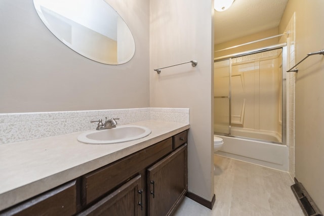 2424 Guenever Ct, Altoona, IA 50009 - bathroom with vanity and shower / bath combination with glass door