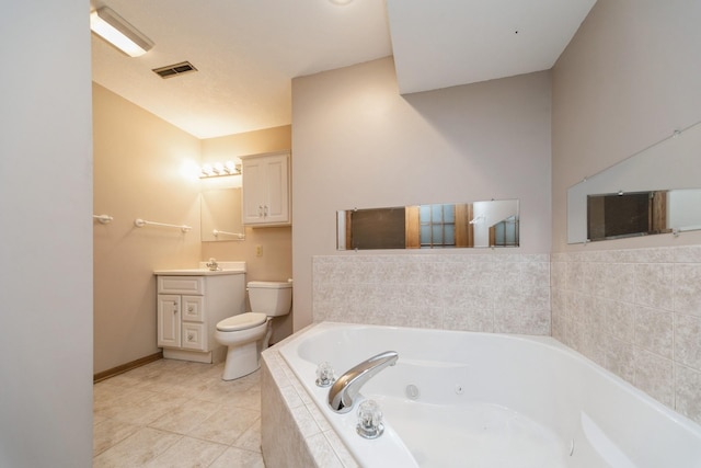 2424 Guenever Ct, Altoona, IA 50009 - bathroom featuring a tub with jets, vanity, and tile patterned flooring