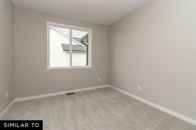 1435 Locust St, Waukee, IA 50263 - carpeted empty room with baseboards