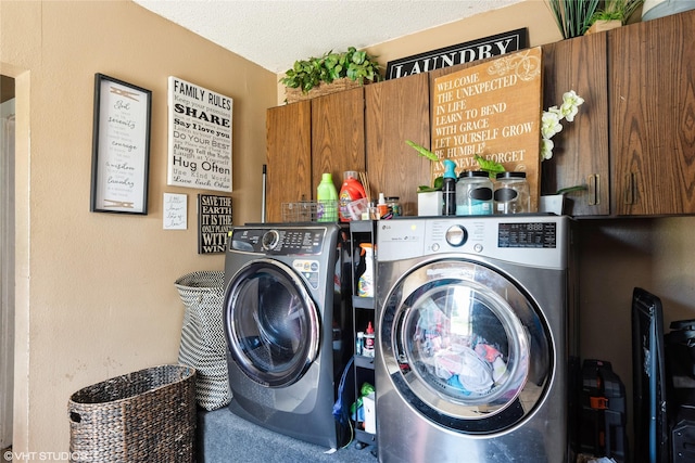 705 E Miller Ave, Des Moines, IA 50315 - laundry room featuring cabinet space, independent washer and dryer, and a textured ceiling