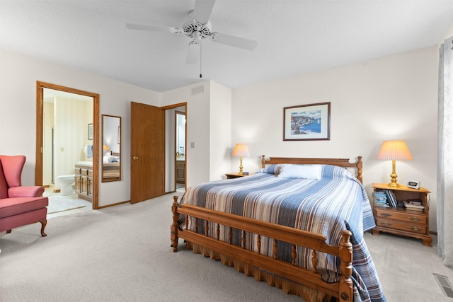 2207 Buchanan Dr, Ames, IA 50010 - bedroom with carpet floors, ensuite bath, and ceiling fan