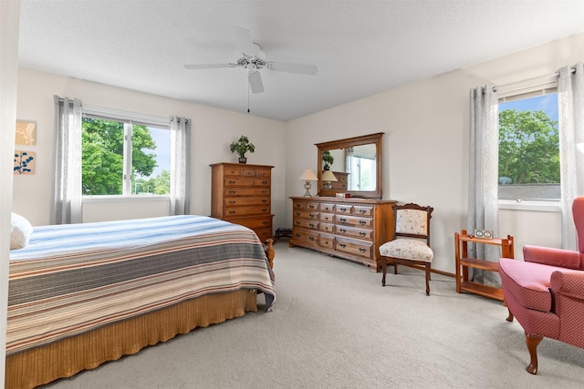 2207 Buchanan Dr, Ames, IA 50010 - bedroom featuring carpet and a ceiling fan
