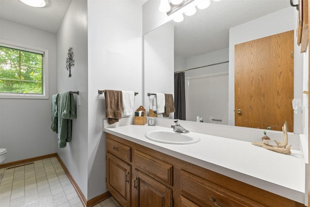 2207 Buchanan Dr, Ames, IA 50010 - bathroom with vanity and a shower with shower curtain